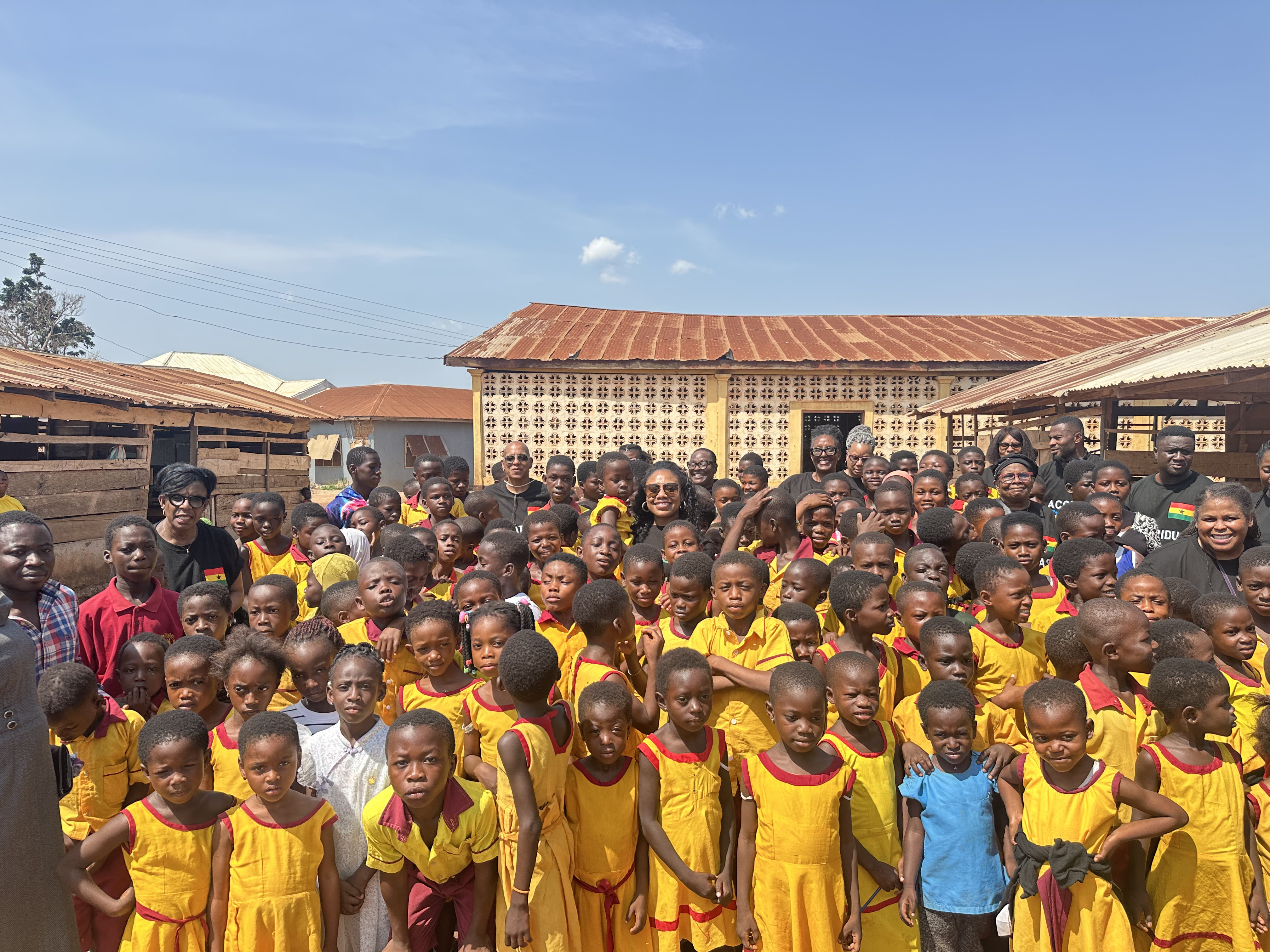 Foundation team with school community Ghana