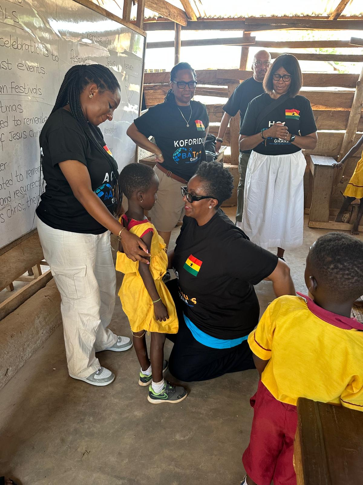 Dr Cooper with youth Ghana
